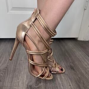 Stunning gold strappy high heels